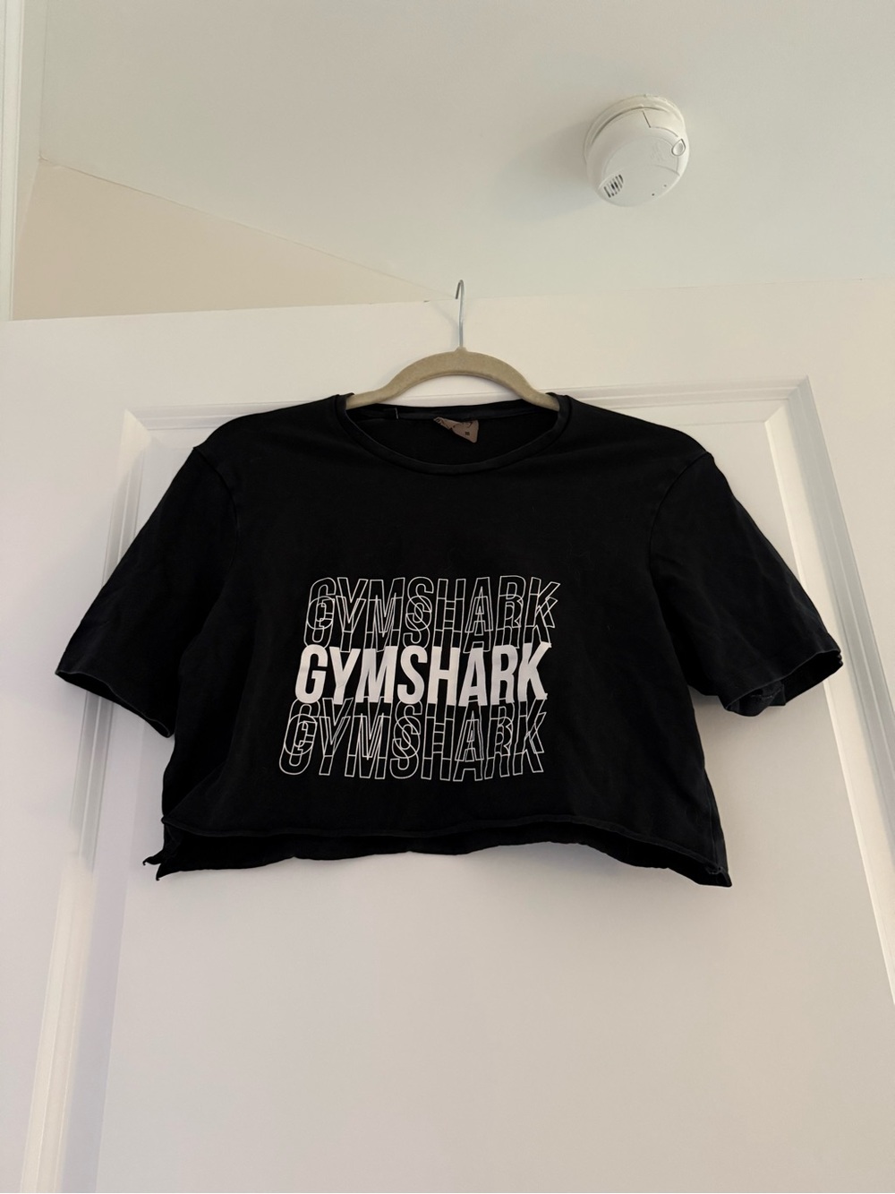 Gymshark Black Tee with White Tag Detail